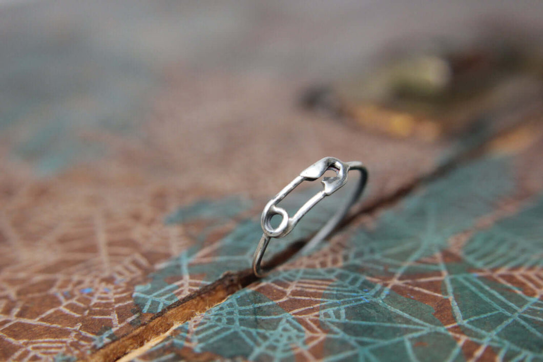 Dainty Little Safety Pin Stacking Ring. Punk rock sterling silver safety pin ring. New baby expectant mother jewelry push present.